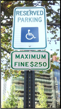 Reserved Parking and Maximum Fine $250 Sign Posted On A Pole