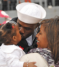 A sailor, a woman and a child