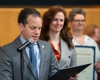 Photo of Councilmember Evan Glass recognizing the ArtStream Players