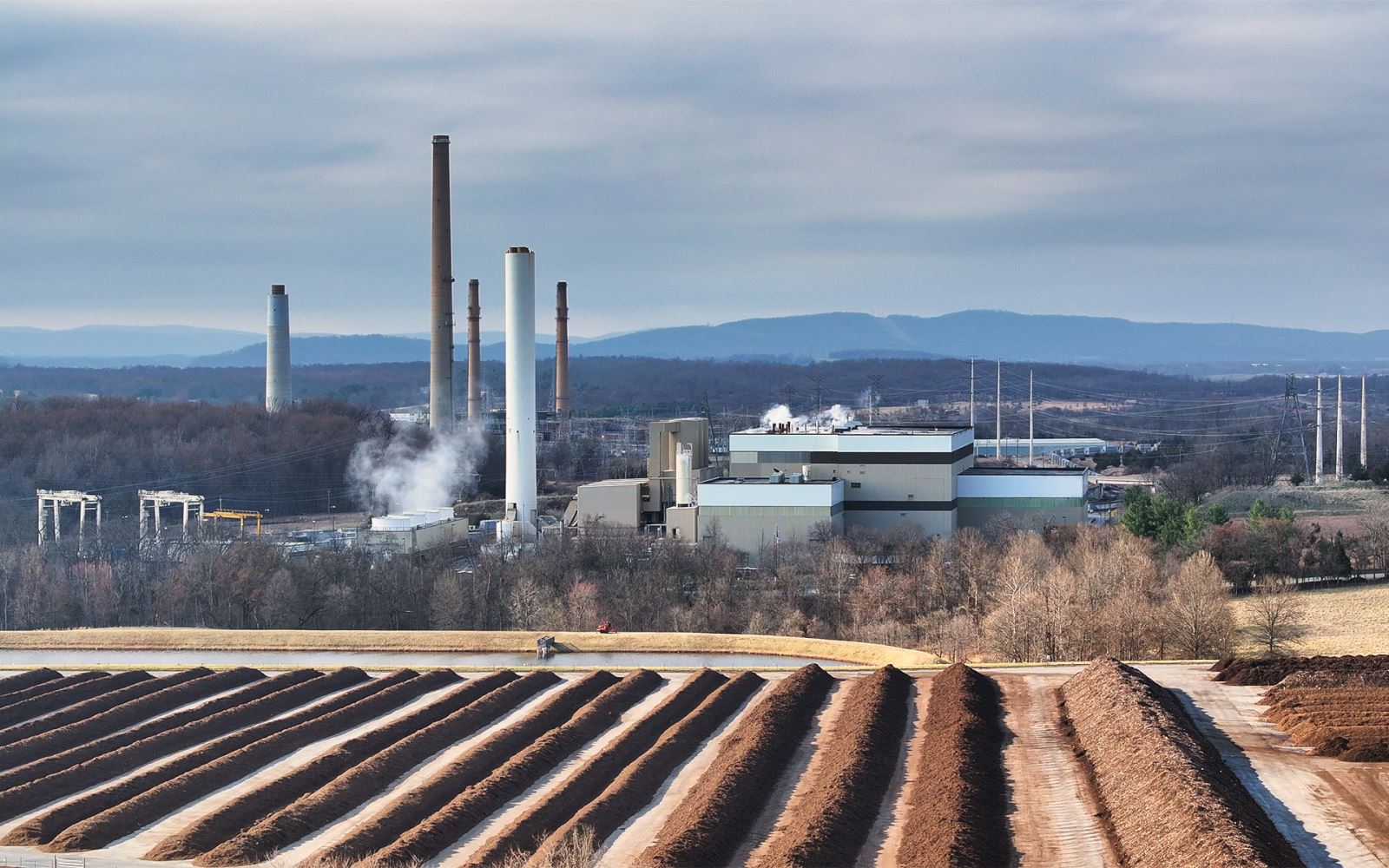 aerial view of emissions stacks from resource recovery facility