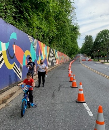 Family with child on bike