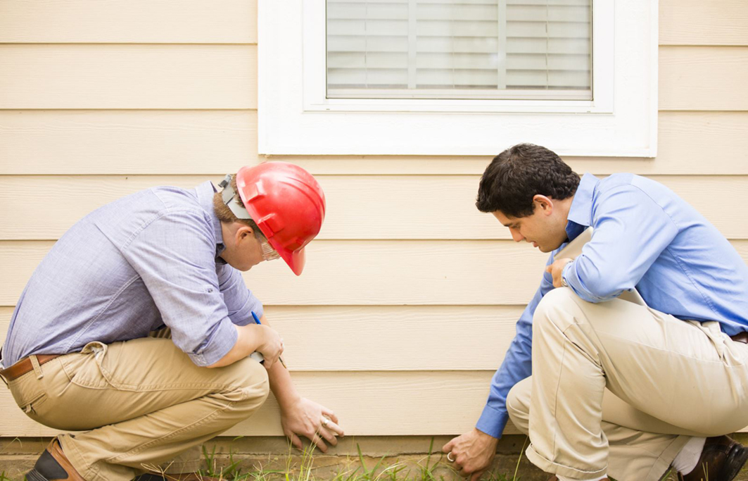 inspector and homeowner during an inspection