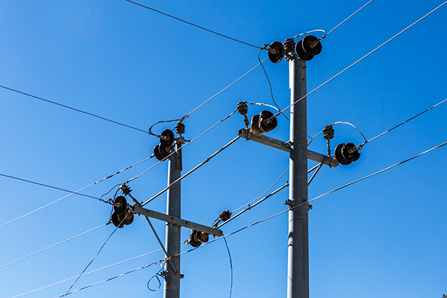 image of power lines connecting to a utility pole in the right of way