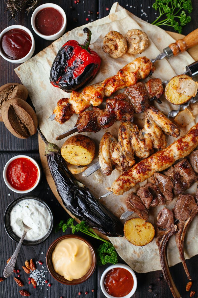 Various Meats and Vegetables that have been grilled to perfection - Summer Food Safety