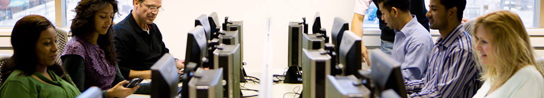 Large group of people in a computer lab.