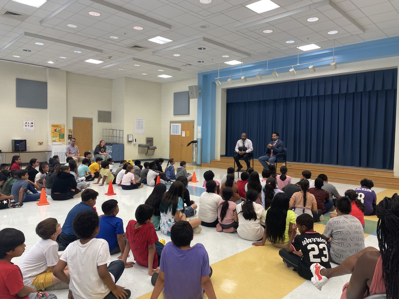 Councilmember Jawando participates in an assembly with elementary schoolers.