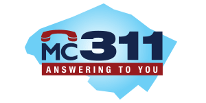 Image shows a map of Montgomery County with the text superimposed saying MC311 Answering for You.