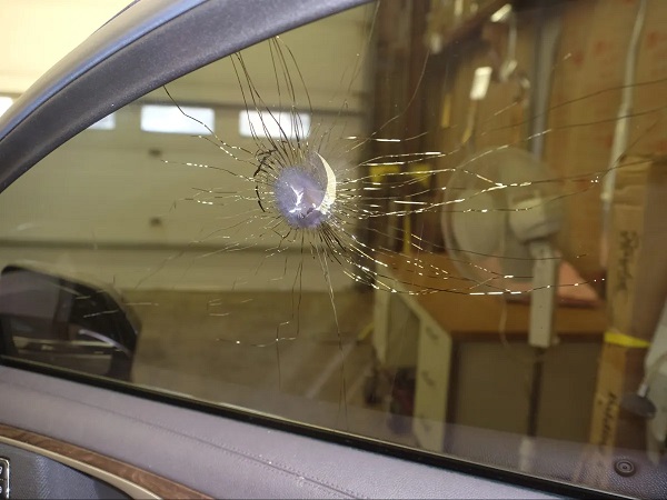 Photo of bullet hole in car window