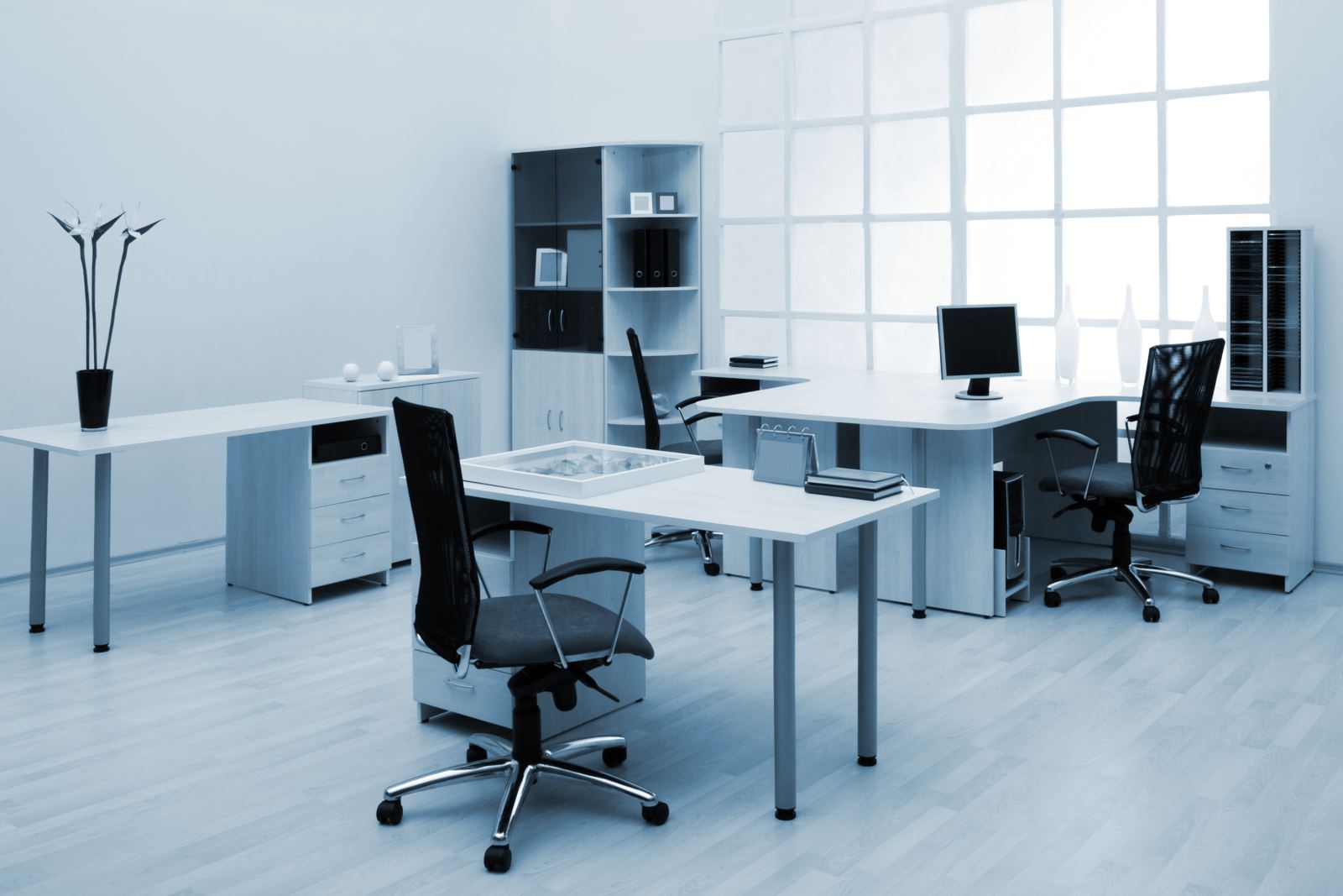 image of an office with desk and chair and a computer