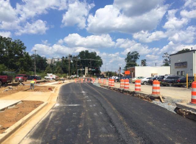 Base paving completed for phase 1; working on phase 2 grading and drainage 