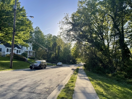 upton drive picture showing a house sidewalk and parked cars