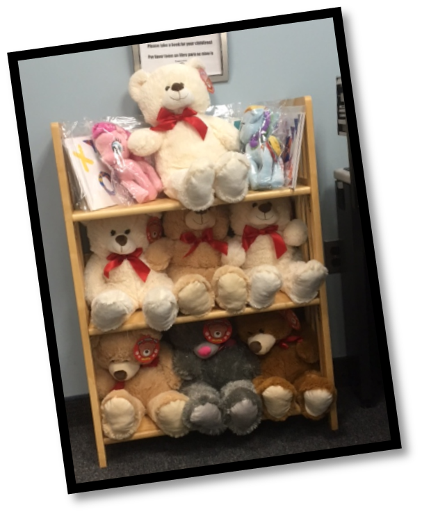Teddy bears sitting on a shelf