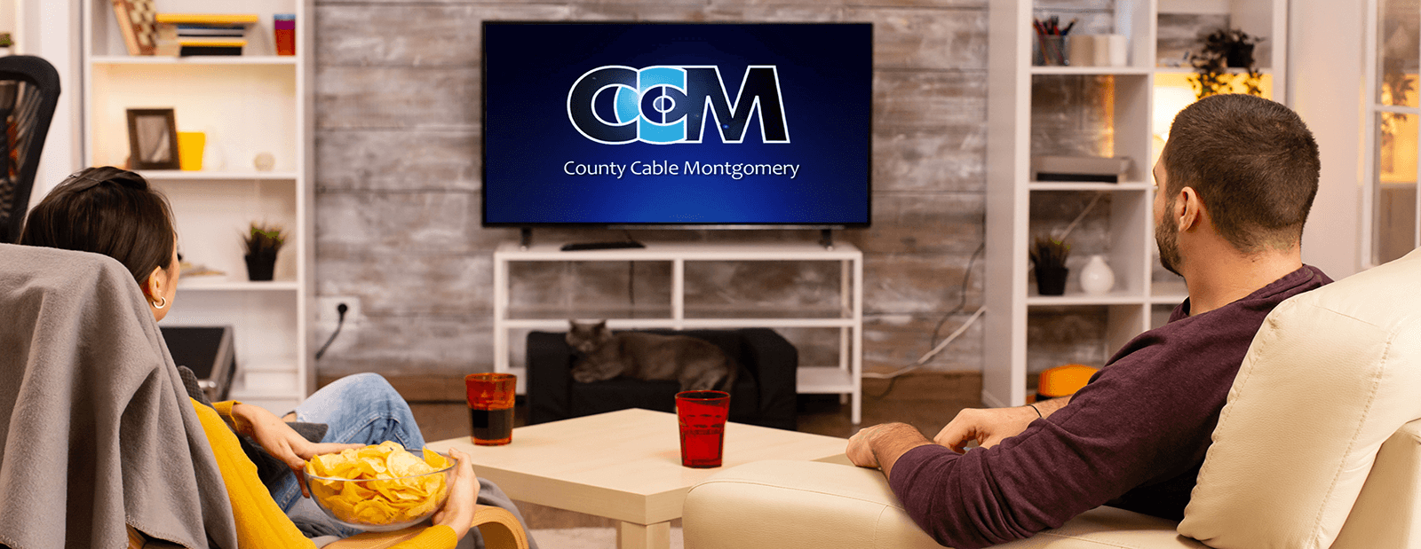 County Cable Montgomery - Image of family watching tv