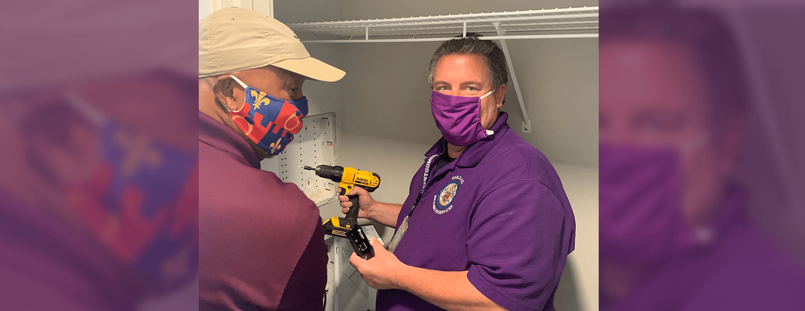 Community Technology Slider - Image of Inspectors Otis and Bryan installing equipment