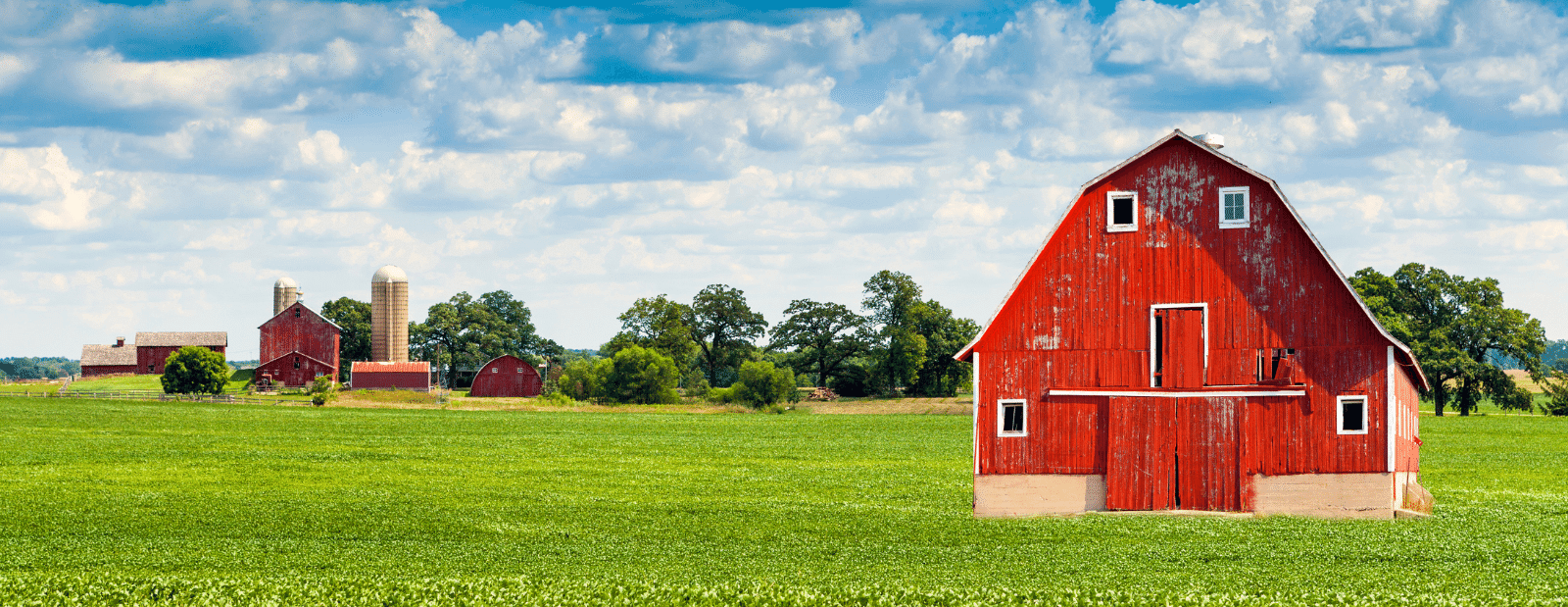 Rural Broadband Report - Image of a red barn in a field
