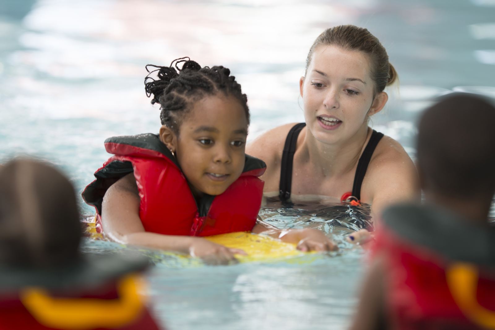 woman and child swim lesson