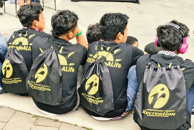 youth with backpacks