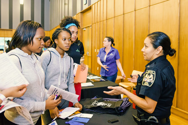youth speaking with police officer