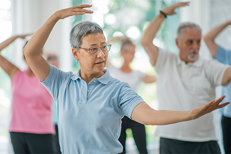 seniors taking tai chi class