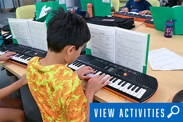 kid in music class, click to register for music classes