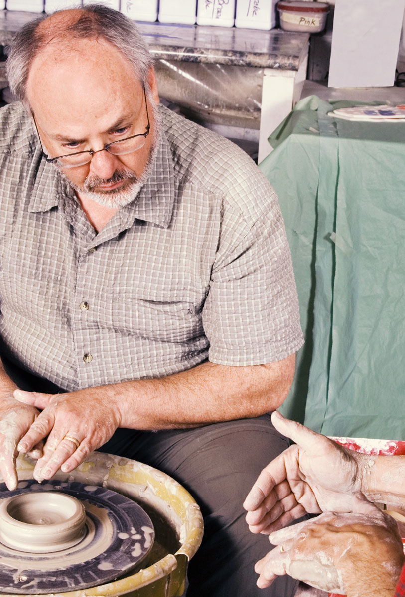 man in pottery class