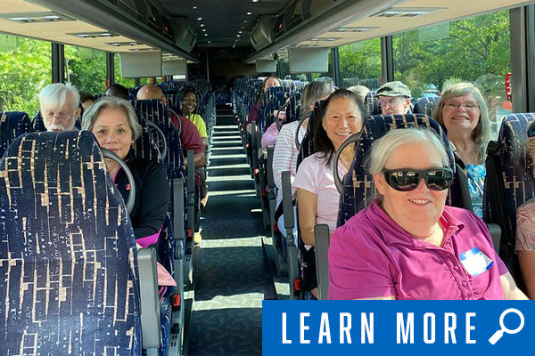 group of senior citizens on tour bus, click to learn more