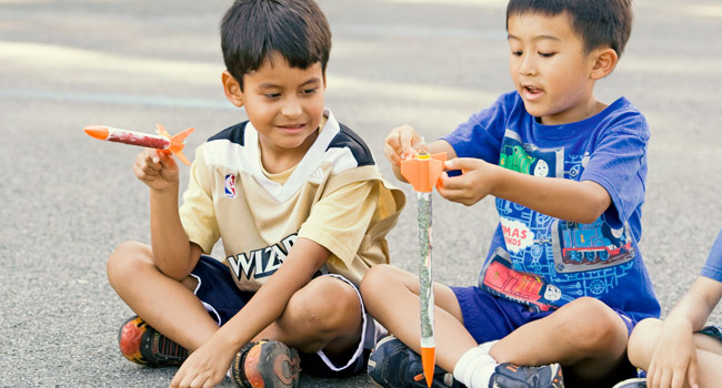 campers building rockets