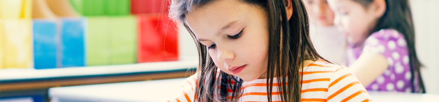 young girl in classroom