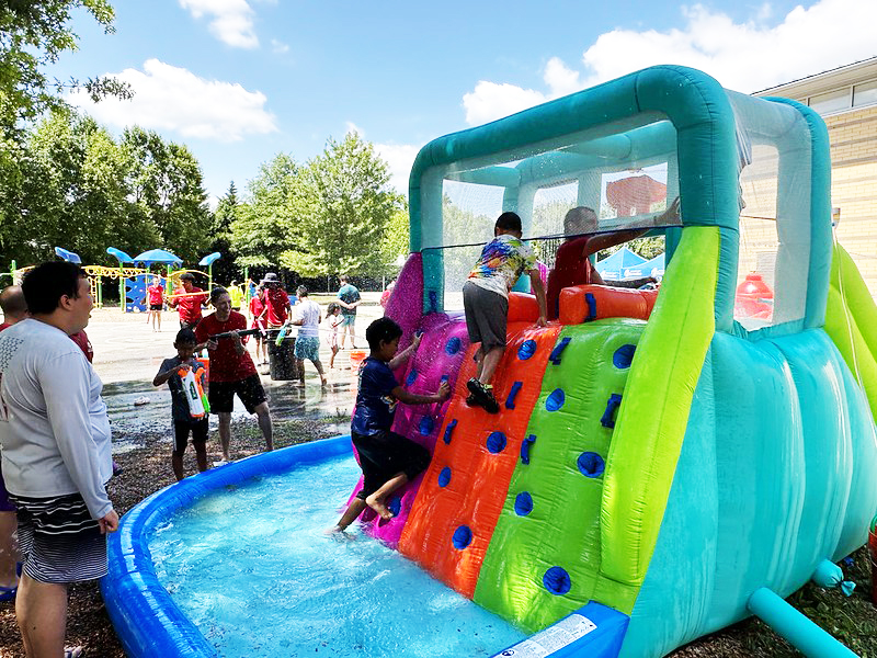 Kids playing in bounce house pool